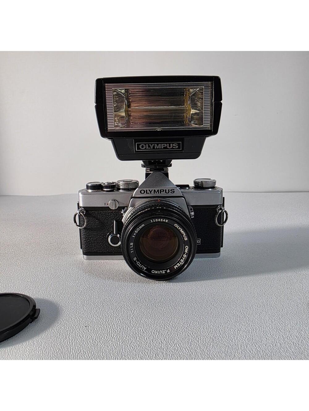 Olympus OM-1 MD 35mm SLR Film Camera w/ F.Zuiko 50mm f/1.8 Lens & Flash Tested